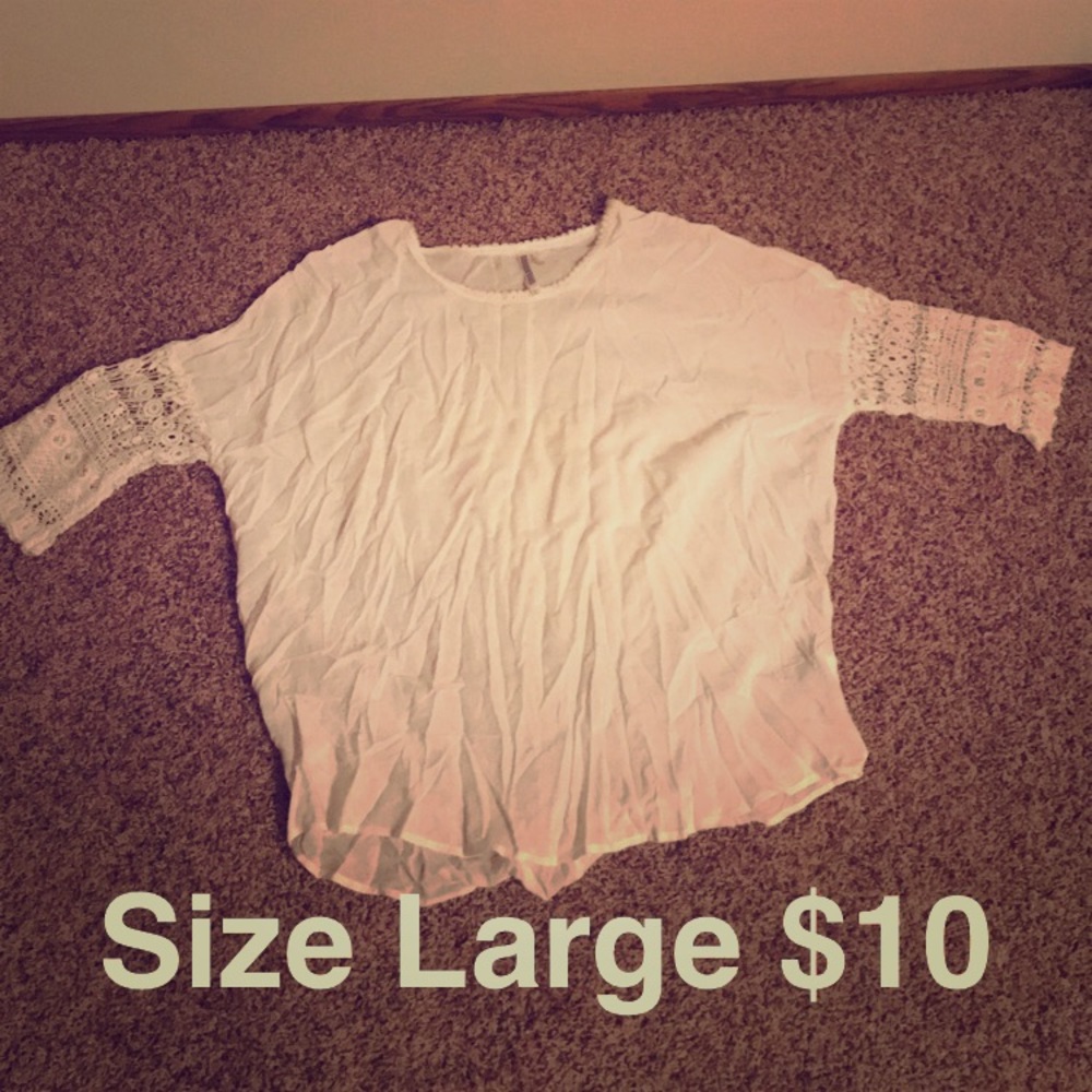 Cream top with lace detail on sleeve